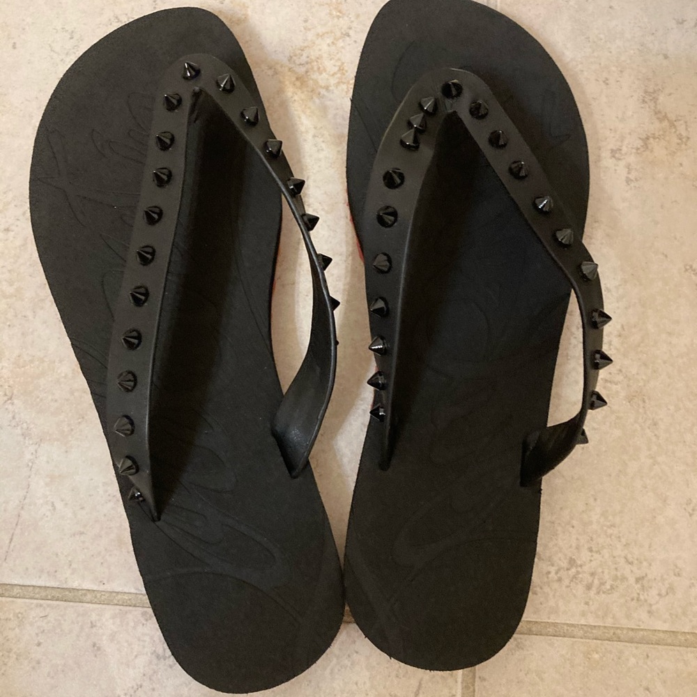 Studded Flip Flops size 7 Black upper. Red sole
